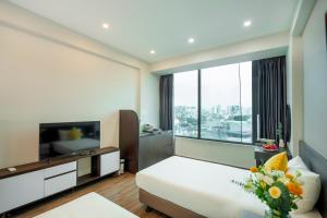 Μια τηλεόραση ή/και κέντρο ψυχαγωγίας στο Ivy Luxury Hotel Ha Noi