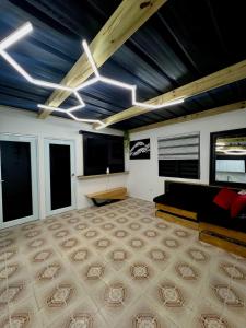 Istumisnurk majutusasutuses Urban Cabin PR-Near to AirPort- Near to Beach +25 fotot