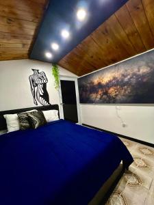 Voodi või voodid majutusasutuse Urban Cabin PR-Near to AirPort- Near to Beach toas