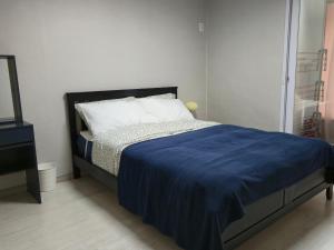 Postel nebo postele na pokoji v ubytování 스테이 휴가 의정부점 + 17 fotografií