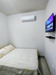 Ένα ή περισσότερα κρεβάτια σε δωμάτιο στο DOLPHIN Maeva Residencial +44 φωτογραφίες