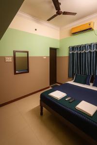 Ένα ή περισσότερα κρεβάτια σε δωμάτιο στο Le Casa Stay