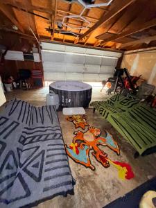 a room with several blankets on the floor at Cozy RV Farm Stay with Hot Tub WiFi and Coffee 5 Min to AHCL Hospital and Redbud Park in Clearlake