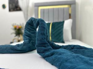 Postel nebo postele na pokoji v ubytování Casa De Las Muñecas RH