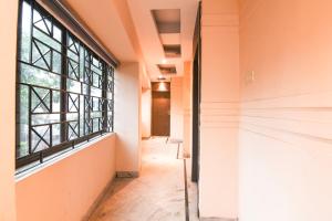 Ένα ή περισσότερα κρεβάτια σε δωμάτιο στο Hotel O The Stay