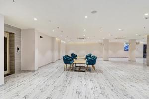 Χώρος καθιστικού στο Townhouse Vibhuti Khand Gomti Nagar Formerly Pratham Inn