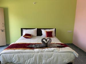 Postel nebo postele na pokoji v ubytování S N Greens