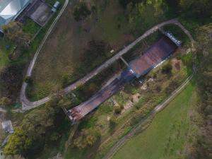 an overhead view of a train on a road at Private Accommodation at the Megaranch in Nyora +4 photos
