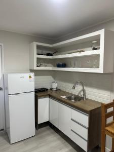 Kuchyň nebo kuchyňský kout v ubytování Contenedor