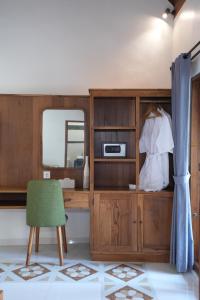 Η κουζίνα ή μικρή κουζίνα στο Kania Rooms & Suite