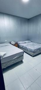 Postel nebo postele na pokoji v ubytování Posada Francelly + 11 fotografií