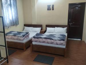 Ένα ή περισσότερα κρεβάτια σε δωμάτιο στο Hotel Unido