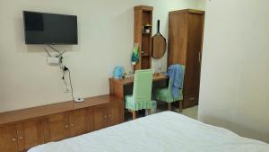 Μια τηλεόραση ή/και κέντρο ψυχαγωγίας στο Homestay Bản Né