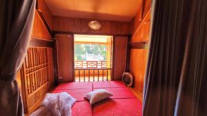 Ένα ή περισσότερα κρεβάτια σε δωμάτιο στο Homestay Bản Né +43 φωτογραφίες