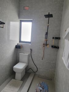 Koupelna v ubytování MARIGOLD APARTMENTS in Salama Park