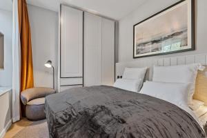 Postel nebo postele na pokoji v ubytování Alte Schule Westerhever Poppenbüll