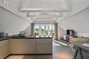 Kuchyň nebo kuchyňský kout v ubytování Alte Schule Westerhever Süderdeich + 14 fotografií