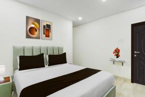 Postel nebo postele na pokoji v ubytování Super Townhouse Nagole RTO Office