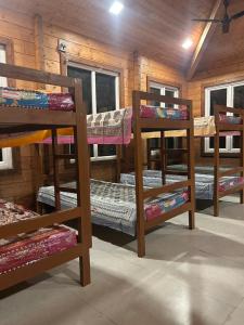 Ένα ή περισσότερα κρεβάτια σε δωμάτιο στο Majuli Backpackers Inn +9 φωτογραφίες