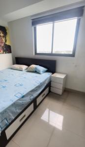 Postel nebo postele na pokoji v ubytování Oval View Residencies By C