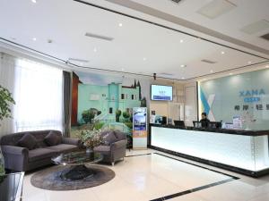a lobby of a clinic with a reception counter at Xana Lite Neijiang Zizhong Shanghehui Branch in Shuinan +232 photos