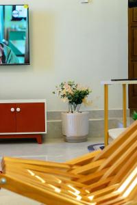 Μια τηλεόραση ή/και κέντρο ψυχαγωγίας στο Sunside Appartments Dodoma +4 φωτογραφίες