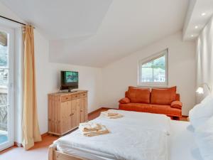 Ένα ή περισσότερα κρεβάτια σε δωμάτιο στο Apartment in Grossarl near Ski Slopes +19 φωτογραφίες