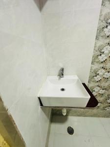 Koupelna v ubytování Hotel Golden Pleasant