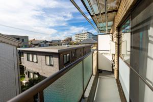 Balkón nebo terasa v ubytování Akazu-hostel new