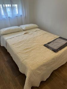 Ένα ή περισσότερα κρεβάτια σε δωμάτιο στο El rincón de Nicolás