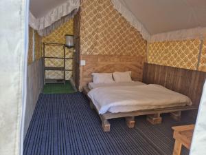 Ένα ή περισσότερα κρεβάτια σε δωμάτιο στο Arc 305 Degree Nature Camp +5 φωτογραφίες