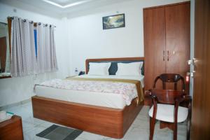 Postel nebo postele na pokoji v ubytování Rama Grand Palace + 63 fotografií