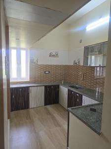 Η κουζίνα ή μικρή κουζίνα στο Rakesh's house