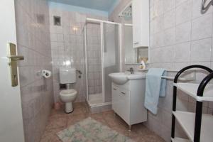 Kúpeľňa v ubytovaní Apartment Stanka-Rab