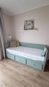 Postel nebo postele na pokoji v ubytování Studio apartment with gym and coworking space + 10 fotografií