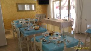 Een restaurant of ander eetgelegenheid bij Hotel Solaris