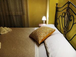 Postel nebo postele na pokoji v ubytování B&B Harmonia