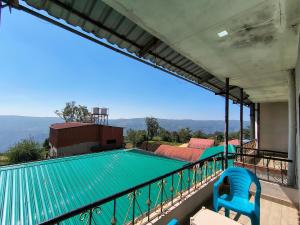 Μπαλκόνι ή βεράντα στο Hotel Shinde Niwas Mahableshwar