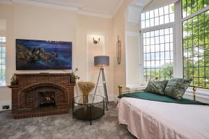 Ένα ή περισσότερα κρεβάτια σε δωμάτιο στο Holiday Home in Saddleworth, Greater Manchester