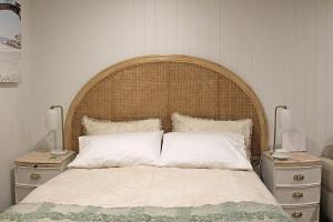 Ένα ή περισσότερα κρεβάτια σε δωμάτιο στο Beachfront Studio Fabulous Location