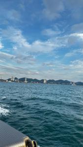 a view of a body of water from a boat at The Sunset Exclusive Top Floor in Chon Buri +8 photos
