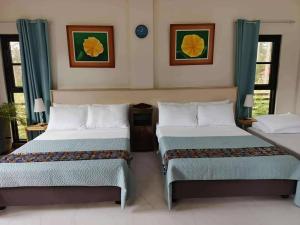 Postel nebo postele na pokoji v ubytování Ojala Beach Resort