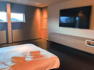 Μια τηλεόραση ή/και κέντρο ψυχαγωγίας στο SENJA Dewata