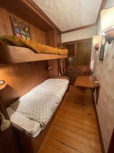 Ένα ή περισσότερα κρεβάτια σε δωμάτιο στο Appartamento La Montanella