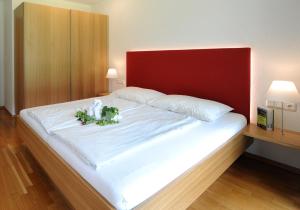 Postel nebo postele na pokoji v ubytování Apartments Susanne