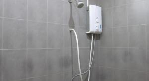 a shower in a bathroom with a shower head at The Palm Village in Ban Non Chan +172 photos