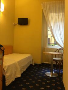 Postel nebo postele na pokoji v ubytování My Hotel Milano + 21 fotografií