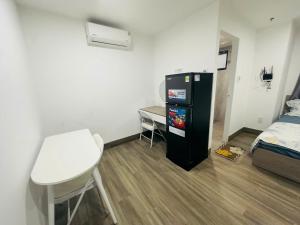 Postel nebo postele na pokoji v ubytování Thiên Khánh Apartment