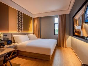 Μια τηλεόραση ή/και κέντρο ψυχαγωγίας στο Orange Hotel Shanghai No.10 Huaihai Middle Road