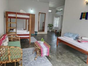 Postel nebo postele na pokoji v ubytování HURGEN Stay & Backpacker Hostel